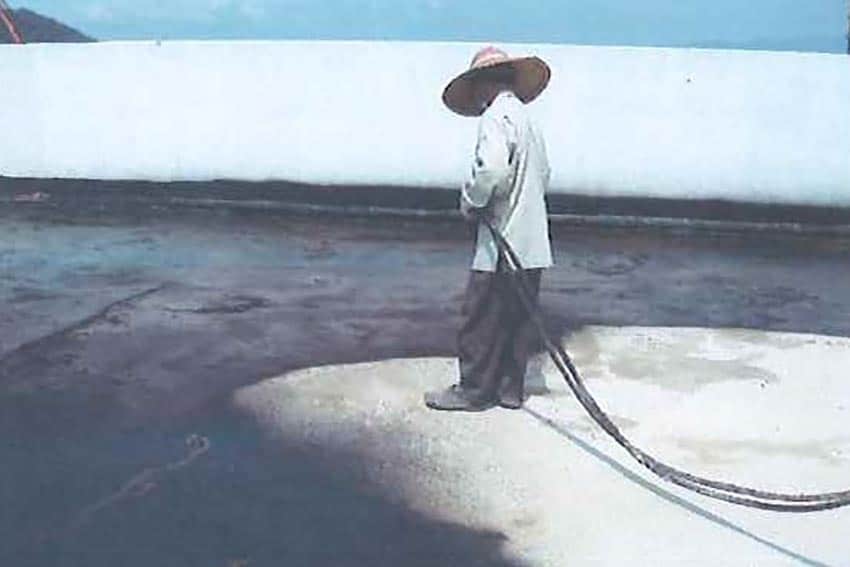 Application of Topseal SM to roof